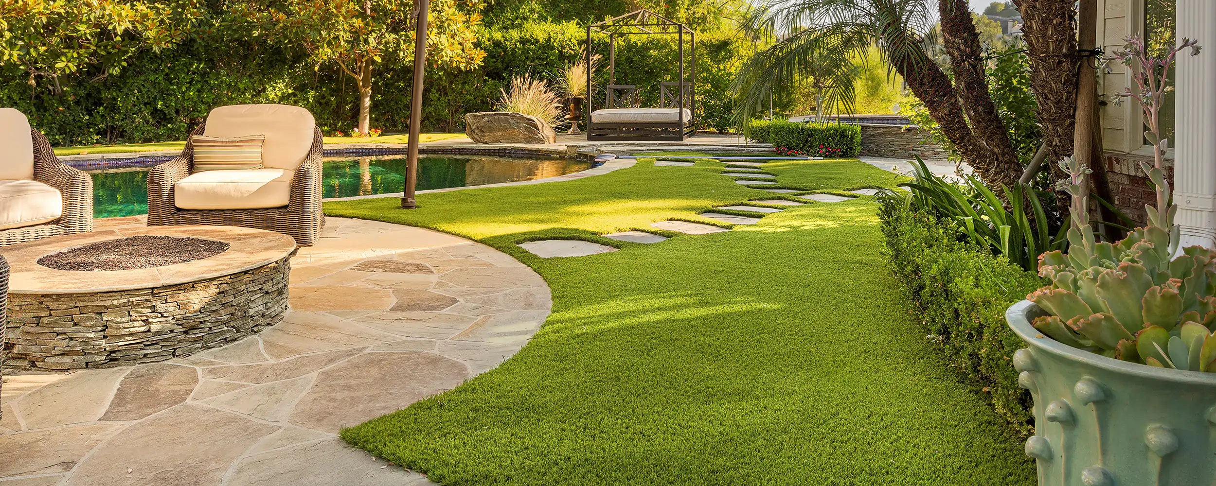 Family enjoying artificial turf backyard in Dallas in Dallas - Artificial Turf Installation of Dallas